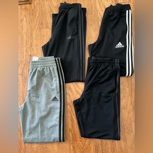 Lot of 4 Mens Adidas athletic pants, size Md